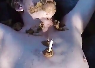 He is tied to the stairs and women are using him