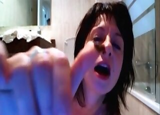 Bathroom fetishism with a brunette who has a huge ass