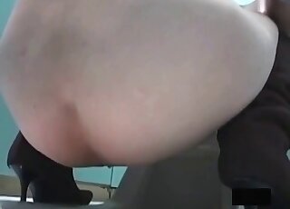 Squatting in front of the camera and putting a show